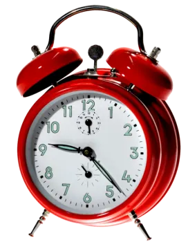 a red alarm clock on a white background
