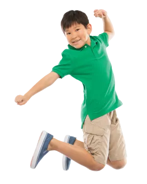 a young boy is jumping in the air