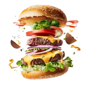 a hamburger falling into the air