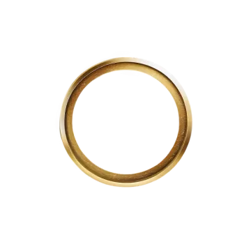 a gold wedding ring on a white background