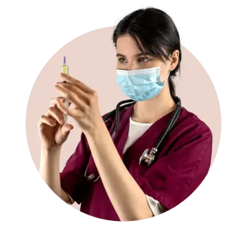 a woman wearing a face mask and holding a sy