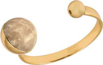 a close up of a gold cuff with an oval stone