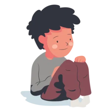 a little boy sitting on the floor with his arms crossed