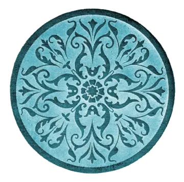 a circular rug with an ornate design on it