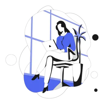a woman sitting in an office chair with her laptop