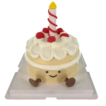 a cake with a santa hat on top
