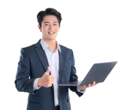 a man in a suit holding a laptop