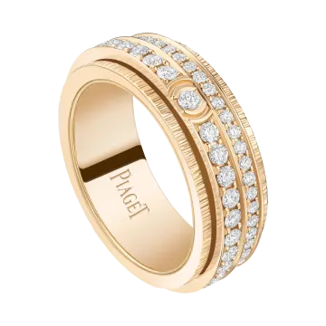 a yellow gold ring with diamonds