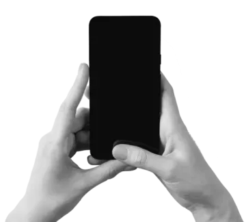 a person holding up their phone in the air