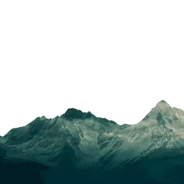 a plane flying over a mountain range
