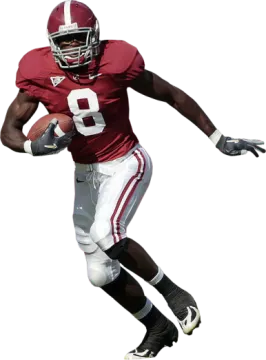a football player is running with the ball
