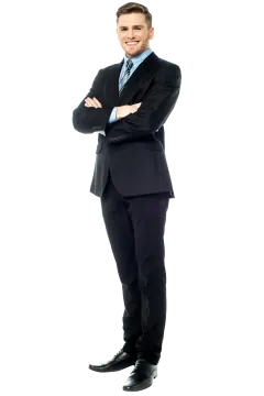a man in a suit standing with his arms crossed