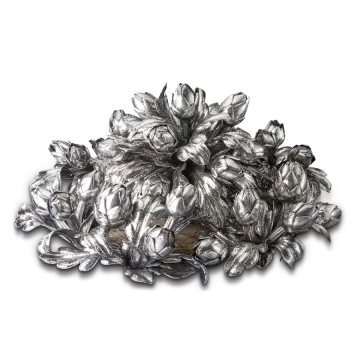 a pile of silver leaves on white background