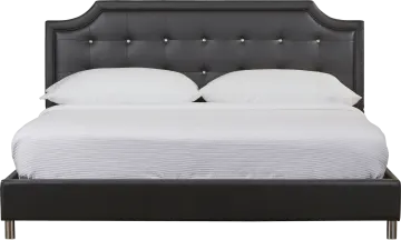 a black bed with white sheets and pillows