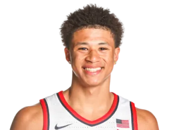a young man in a white and red uniform