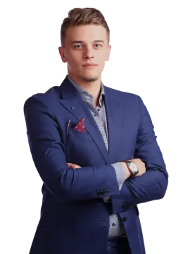 a man in a blue suit with his arms crossed