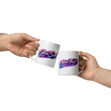 two hands holding coffee mugs with the word love