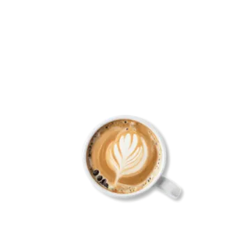 a cup of coffee on a white surface