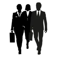 silhouettes of two people walking down the street