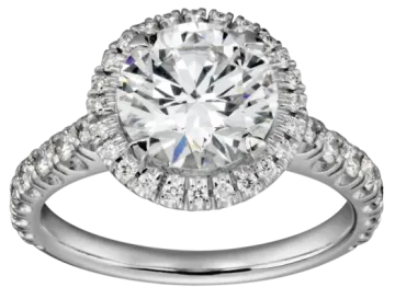 a white gold engagement ring with an oval center surrounded by round diamonds