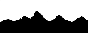 a black and white silhouette of mountains