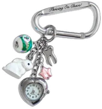 a key chain with a clock and charms