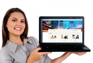 a woman holding up a laptop computer