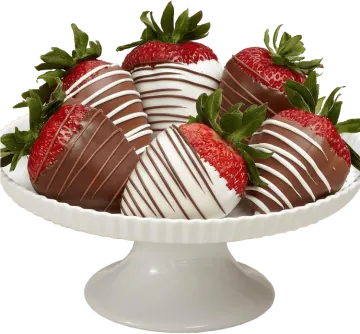 chocolate covered strawberries on a white cake stand
