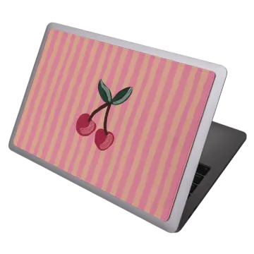 a laptop with a cherry on it