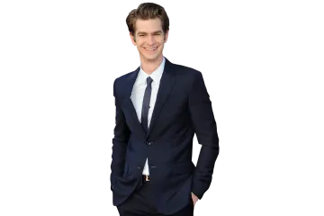 a man in a suit and tie posing for a picture