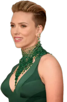 a woman wearing a green dress and necklace