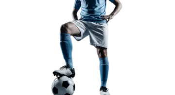 a man in blue and white soccer uniform kicking a soccer ball