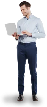 a man in a blue shirt holding a laptop