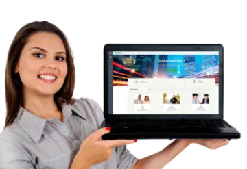 a woman holding up a laptop computer