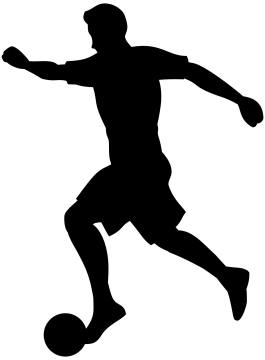 a silhouette of a soccer player kicking