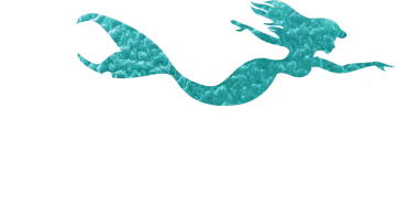 a silhouette of a mermaid swimming in the ocean