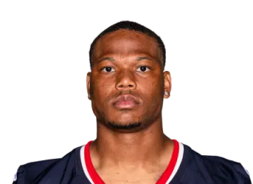 a close up of a football player's face