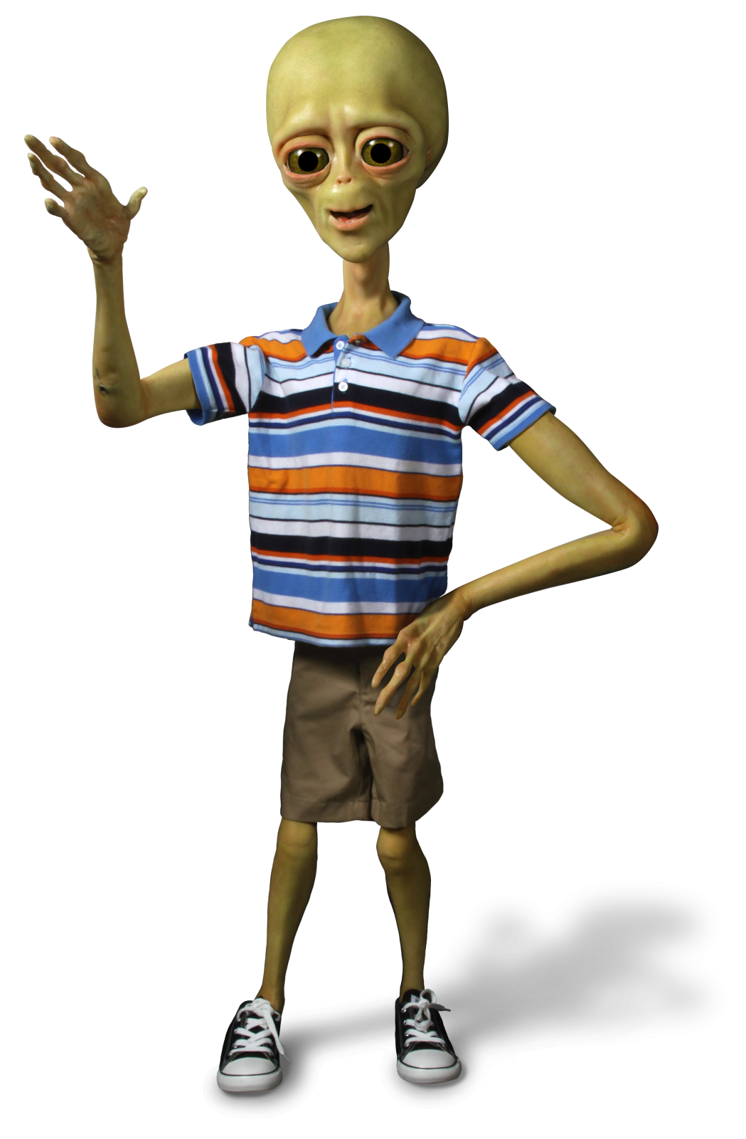 a cartoon alien in a striped shirt and shorts