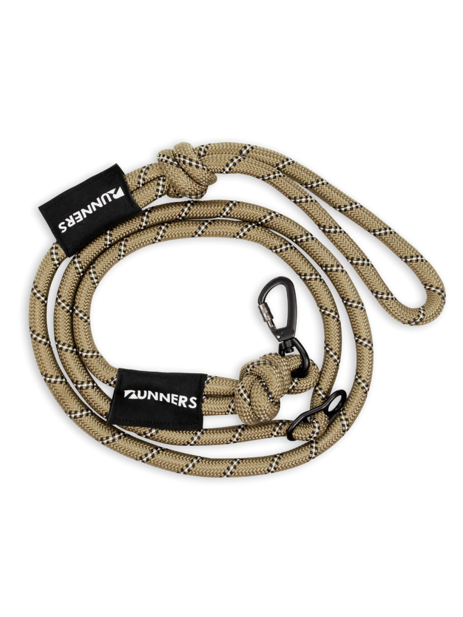 a tan rope with black and white stripes