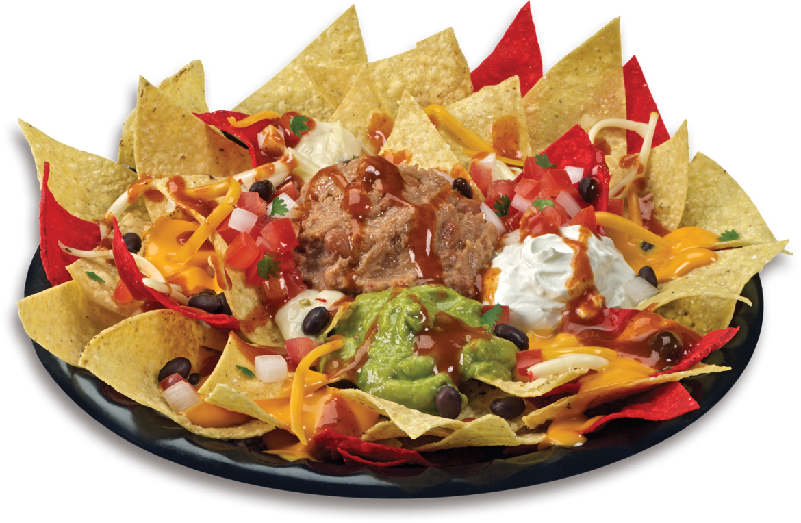 a plate of nachos with meat and vegetables