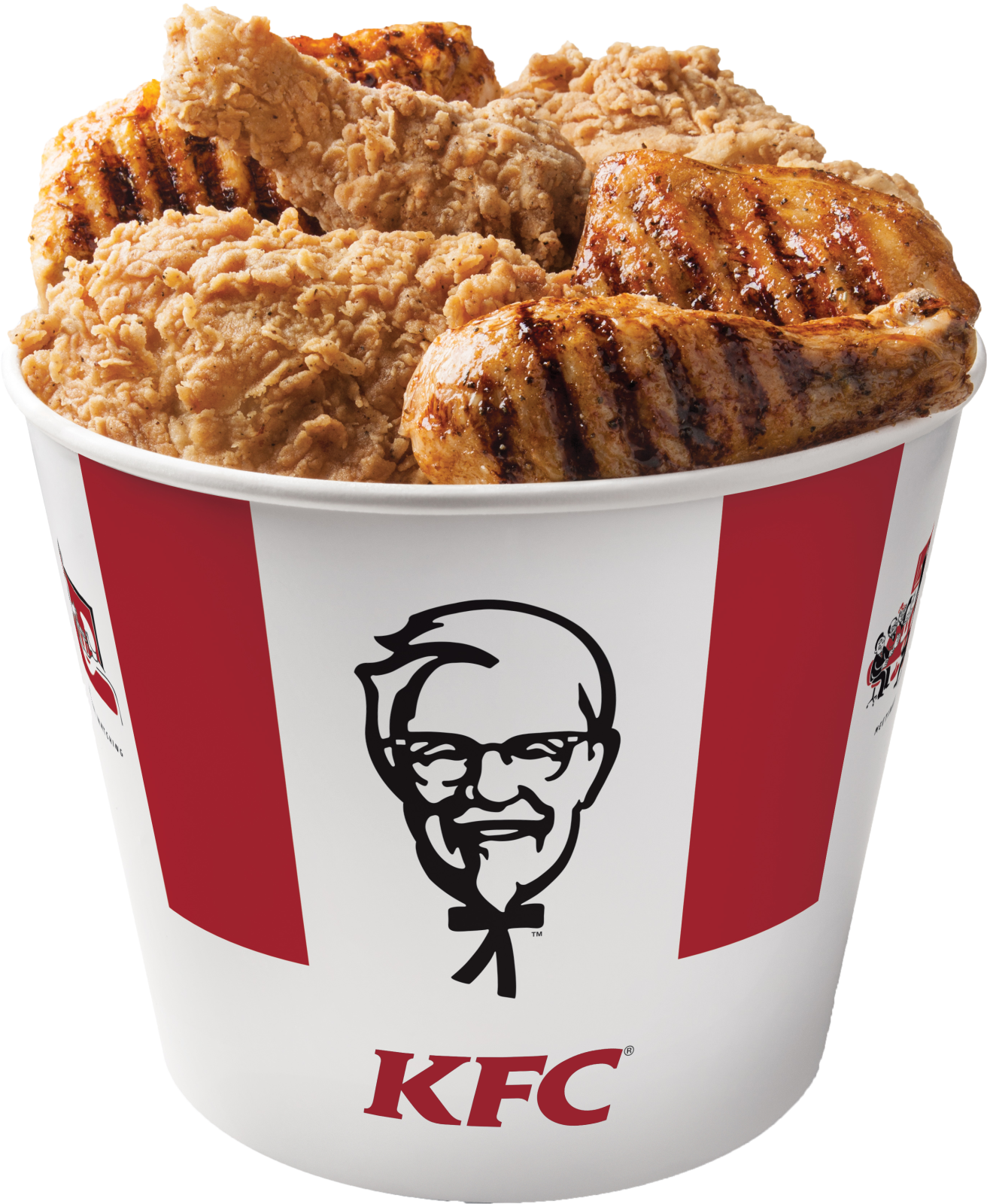 a cup filled with chicken sitting on top of a table