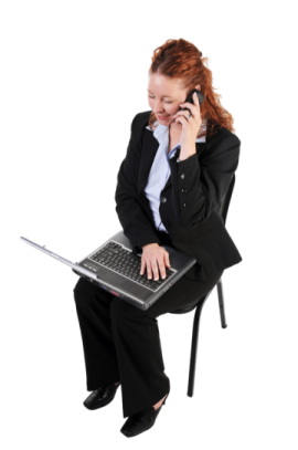 a woman sitting on a chair while talking on her cell