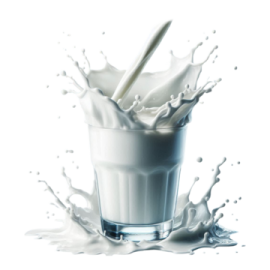 a glass of milk with a spoon in it