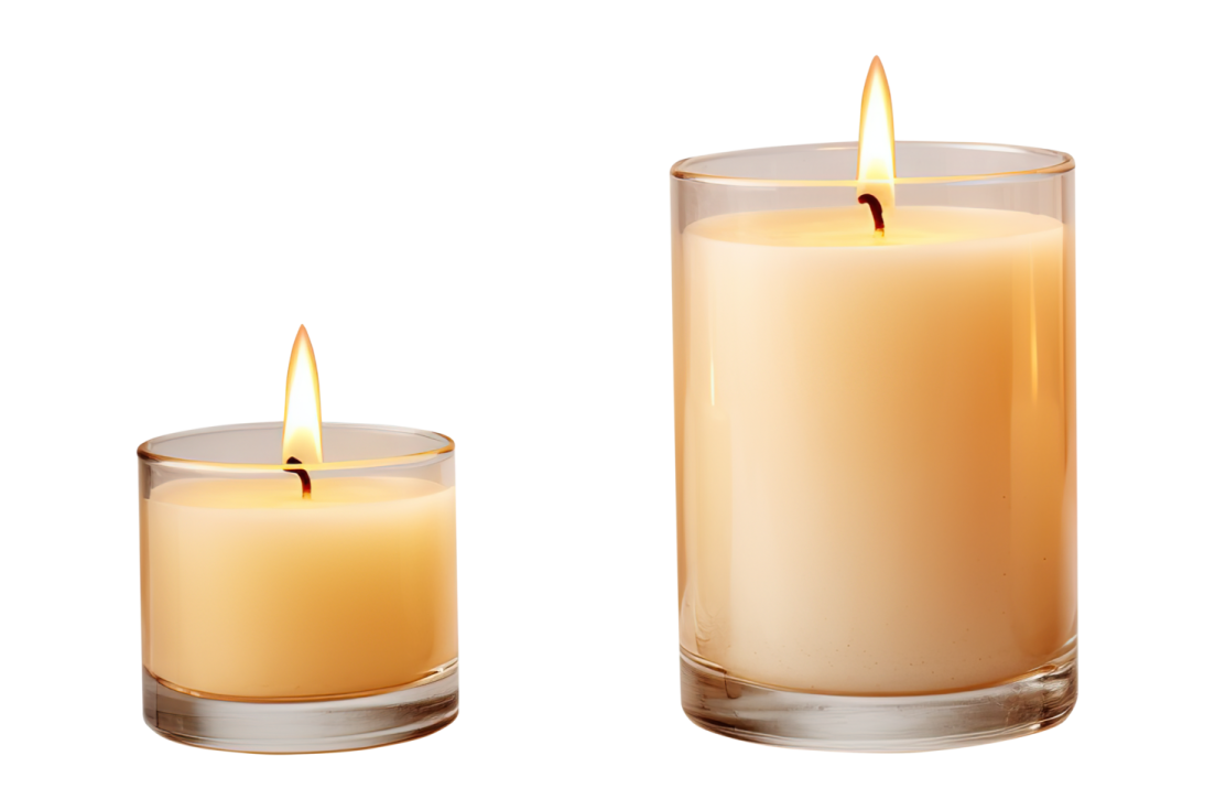 two candles sitting side by side on a white background