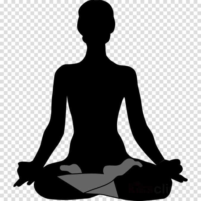 a silhouette of a woman sitting in the lotus position