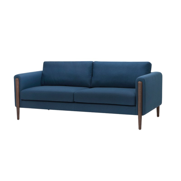 a blue couch with wooden legs and arms