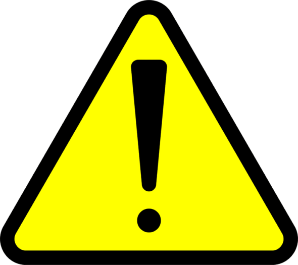 a yellow and black warning sign