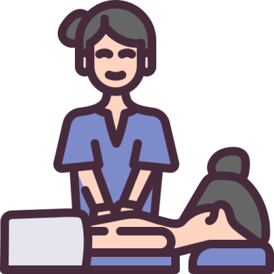 a woman sitting at a desk with her laptop