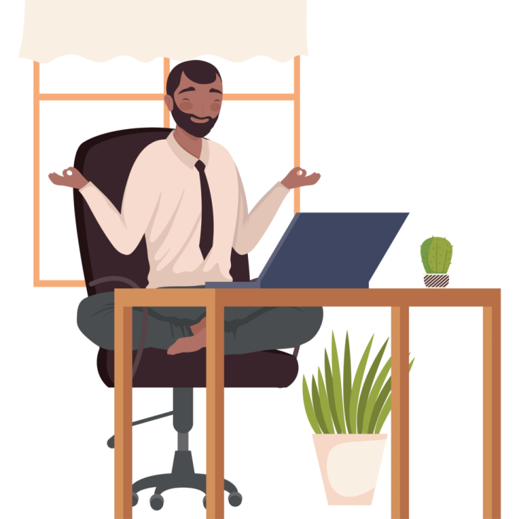 a man sitting at a desk with his laptop