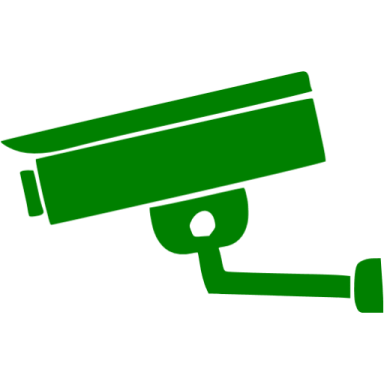 a green surveillance camera